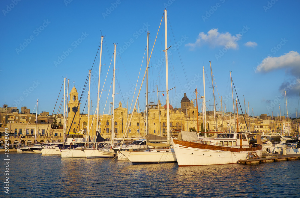 The yachts moored in the harbor in front of Malta Maritime Museum. Malta.