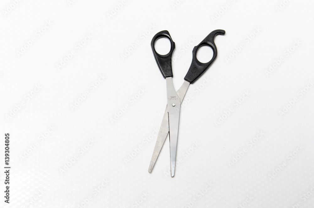 Scissors on white background with copy space Scissors on white background with copy space