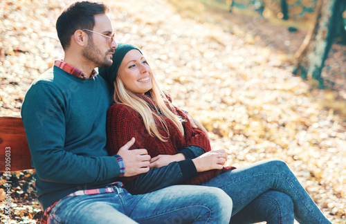 Romantic couple in the autumn park. Love and tenderness. Lifestyle concept