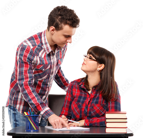 Teenagers doing homework together