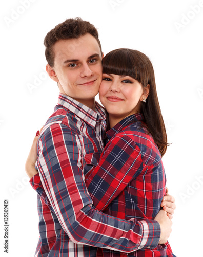 Teenage couple on white