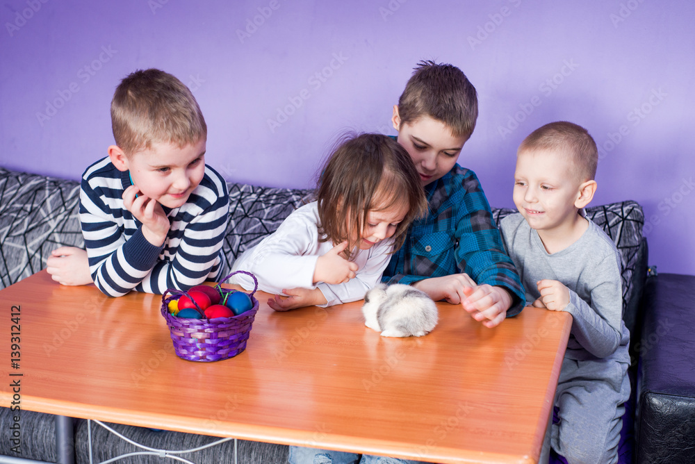 Fototapeta premium Happy children playing on Easter