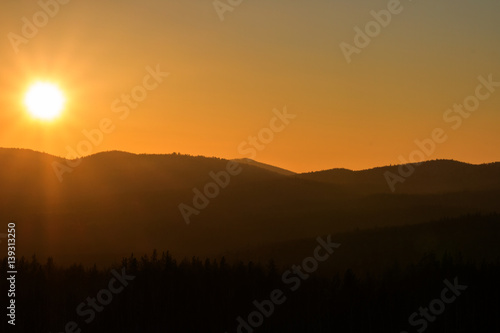 Sunset in the mountains. mountain landscape. Bright sunset over the tranquil mountains