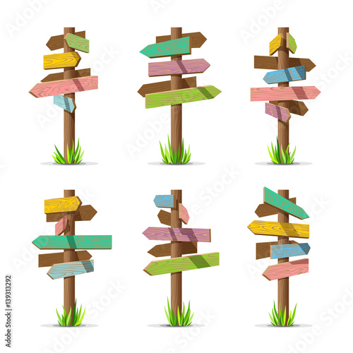 Colored wooden arrow signboards blank vector set. Wood sign post concept with grass. Board pointer illustration isolated on a white background