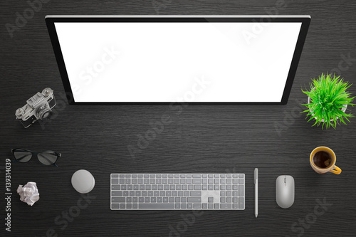 Isolated computer touch screen for mockup. Top view of black desk with camera, glasses, coffee nad plant. Artist pen and dial beside.