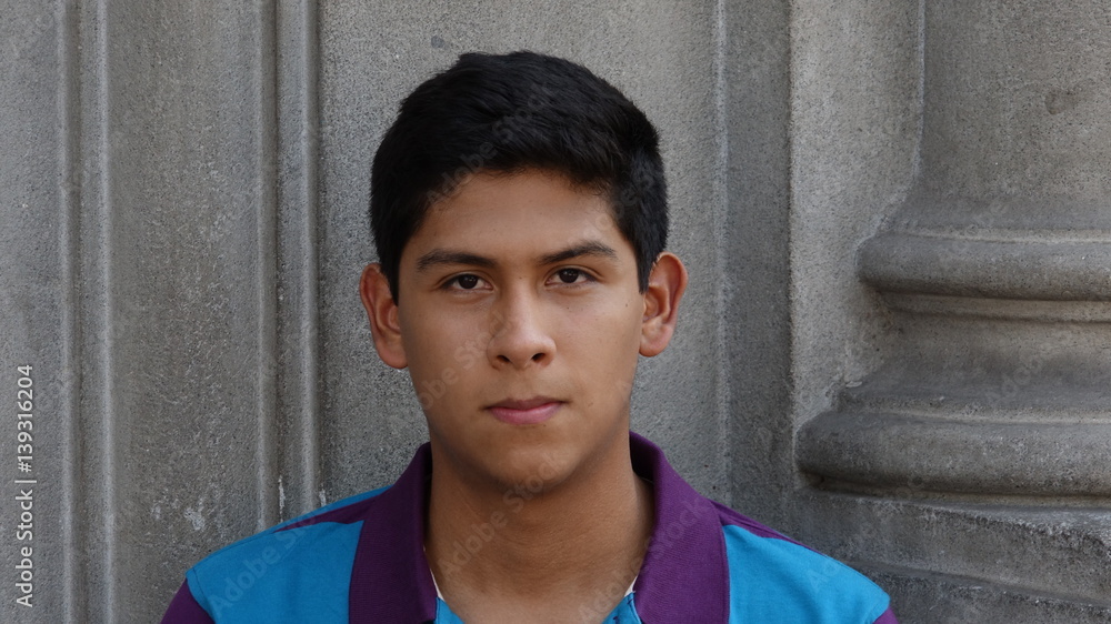Obraz premium Serious Hispanic Teen Boy