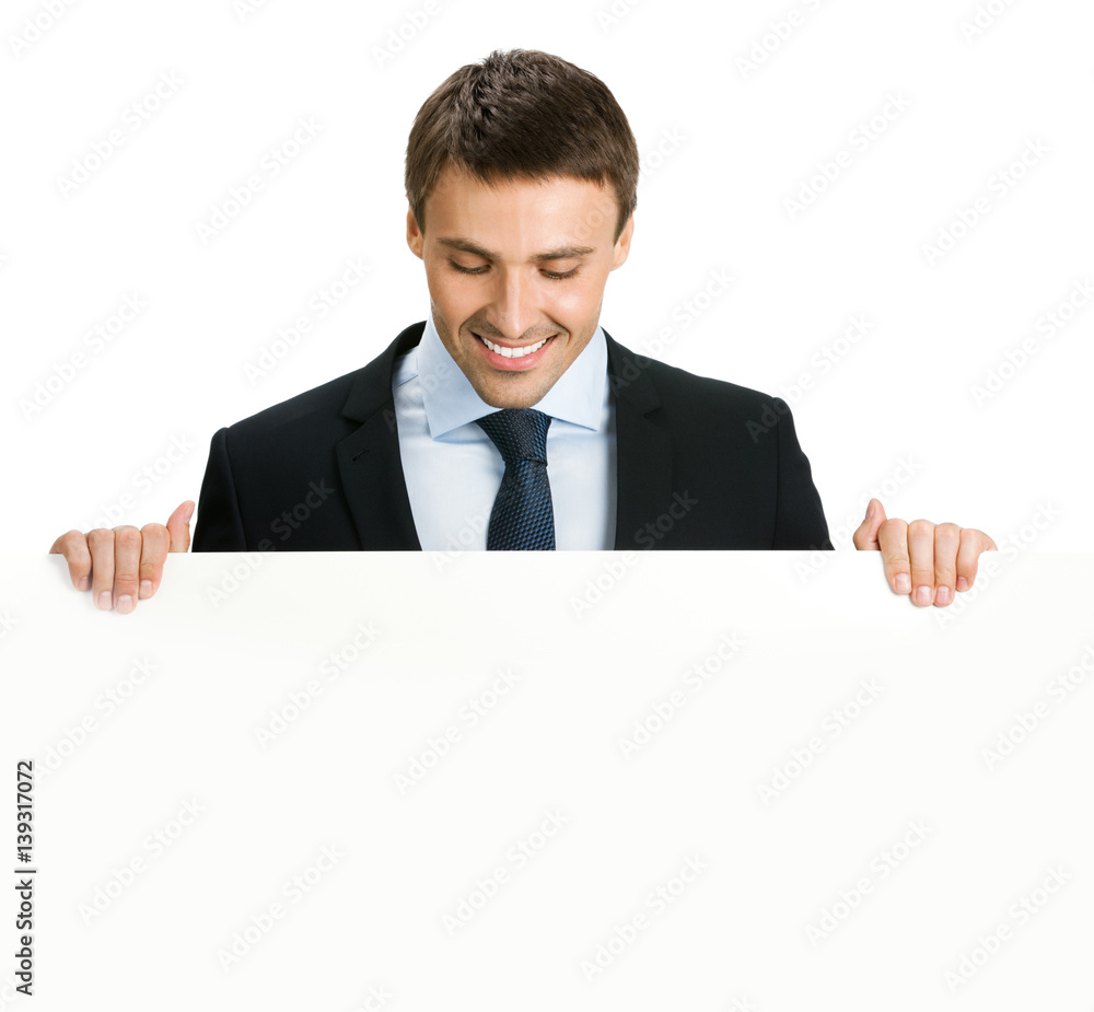 businessman showing signboard with copyspase businessman showing signboard with copyspase
