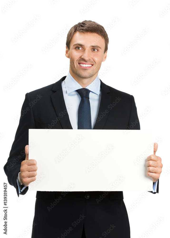 businessman showing signboard with copyspase businessman showing signboard with copyspase
