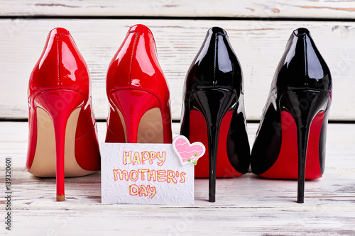 Female footwear and card. Warm greeting on Women's day.