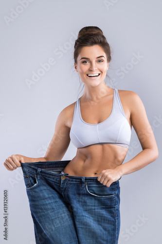 Happy woman after weight-loss