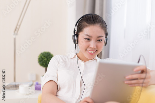 Wallpaper Mural young pretty woman relaxes in room Torontodigital.ca