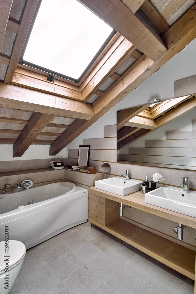 interior view of a modern bathroom in the attic room in foreground the countertop washbasin
 - obrazy, fototapety, plakaty 