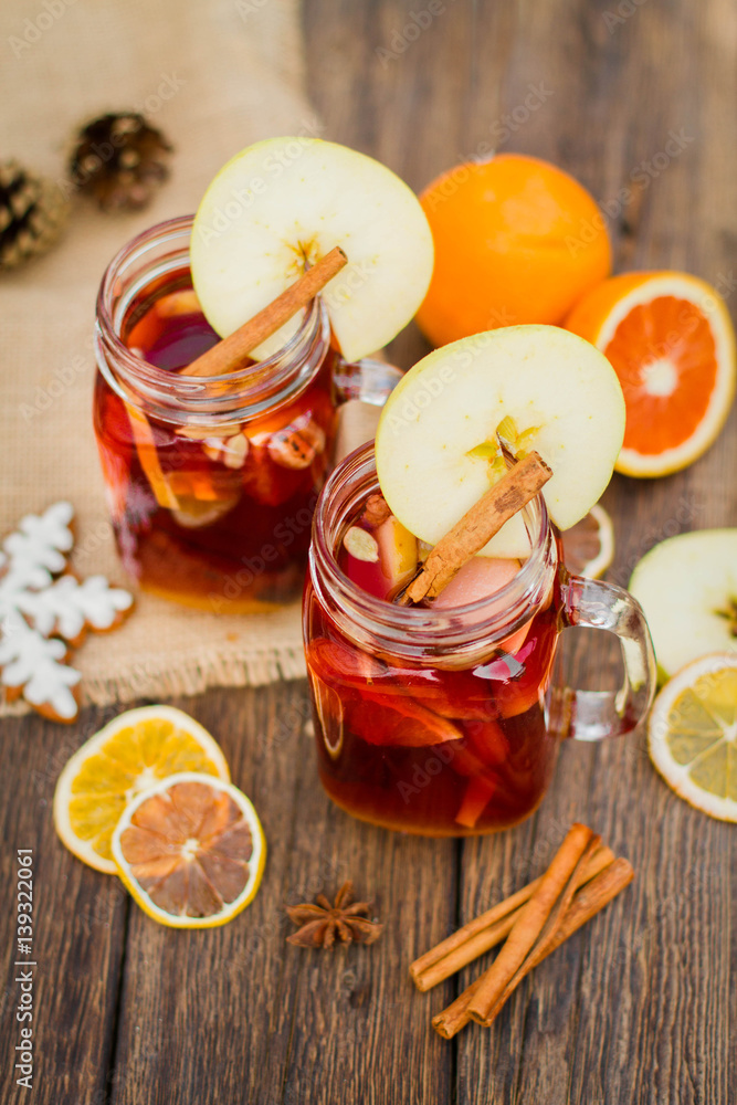 Hot wine on a wooden table