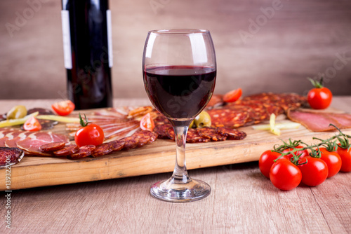 Red wine and smoked meat delicatessen