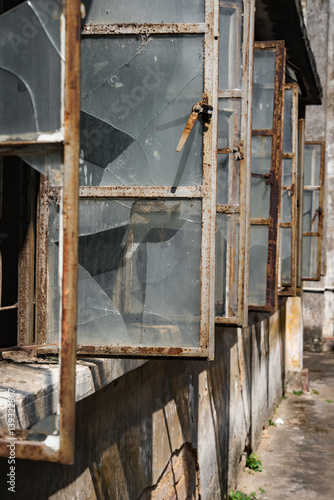 broken windows of an abandoned building