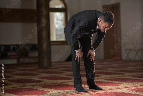 Muslim bowing in prayer