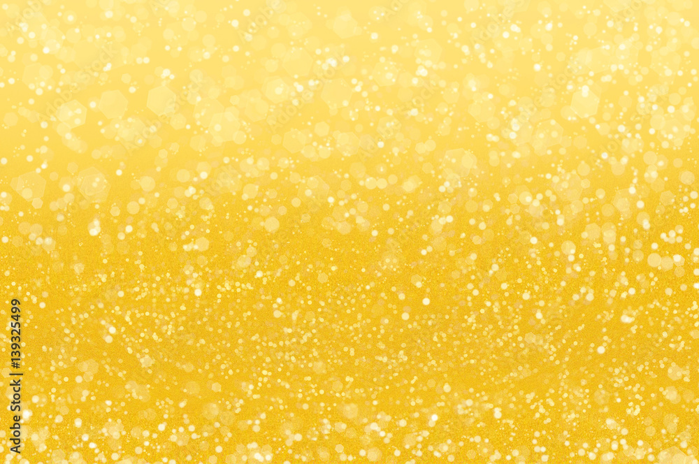 Abstract golden holidays lights on background Abstract golden holidays lights on background