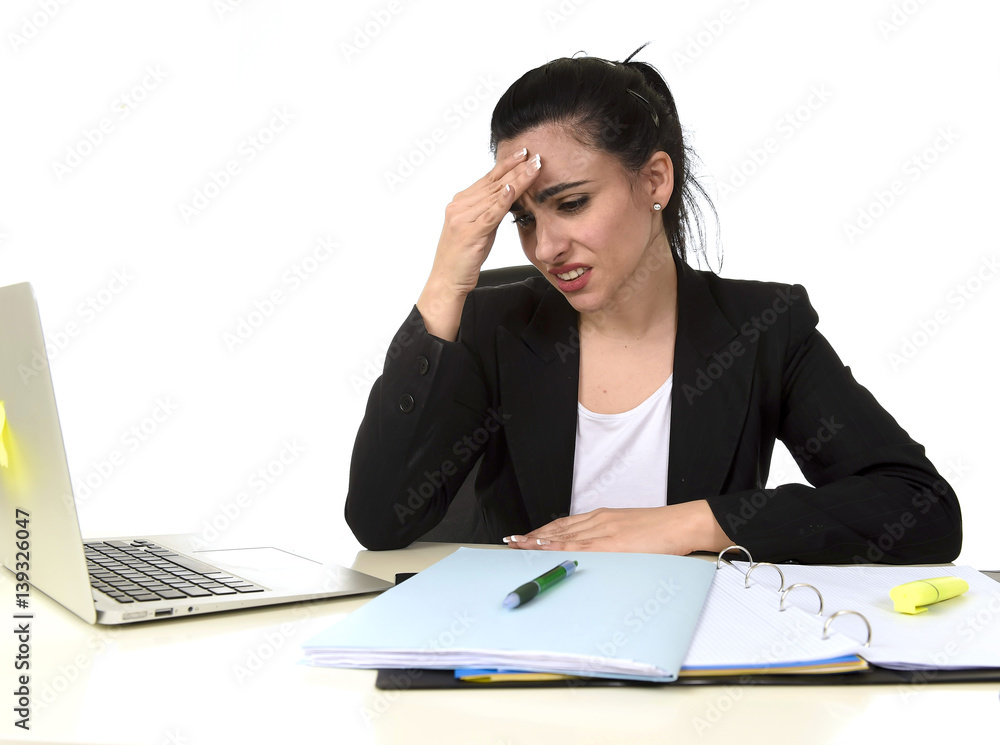 business woman working on laptop at office in stress suffering intense headache migraine business woman working on laptop at office in stress suffering intense headache migraine