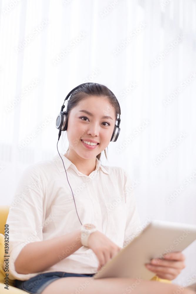 young pretty woman relaxes in room young pretty woman relaxes in room