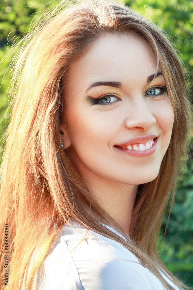 Naklejka premium happy young woman