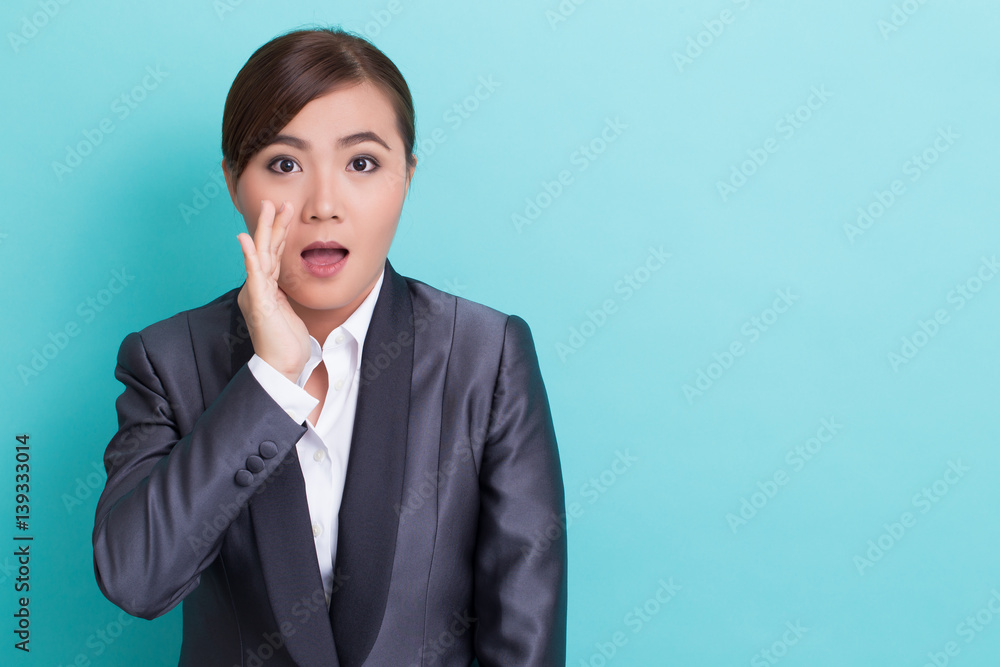 Businesswoman make gossip gesture Businesswoman make gossip gesture