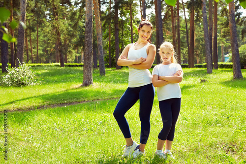 sporty mother and daughter © bakharev