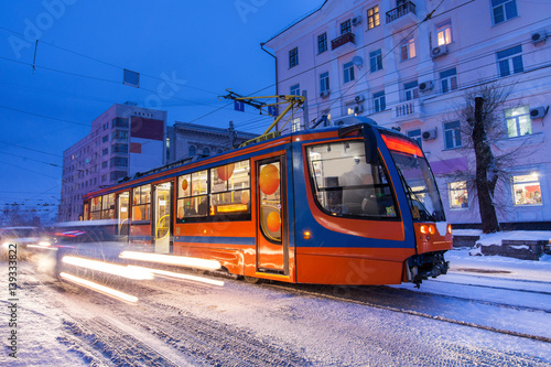 KHABAROVSK, RUSSIA - JANUARY 14, 2017: Tram in the street of winter city of Khabarovsk