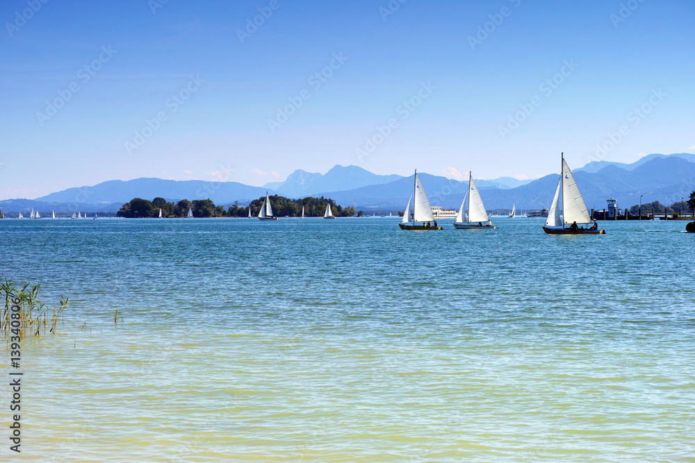Fototapeta premium Floating yachts on lake Chiemsee