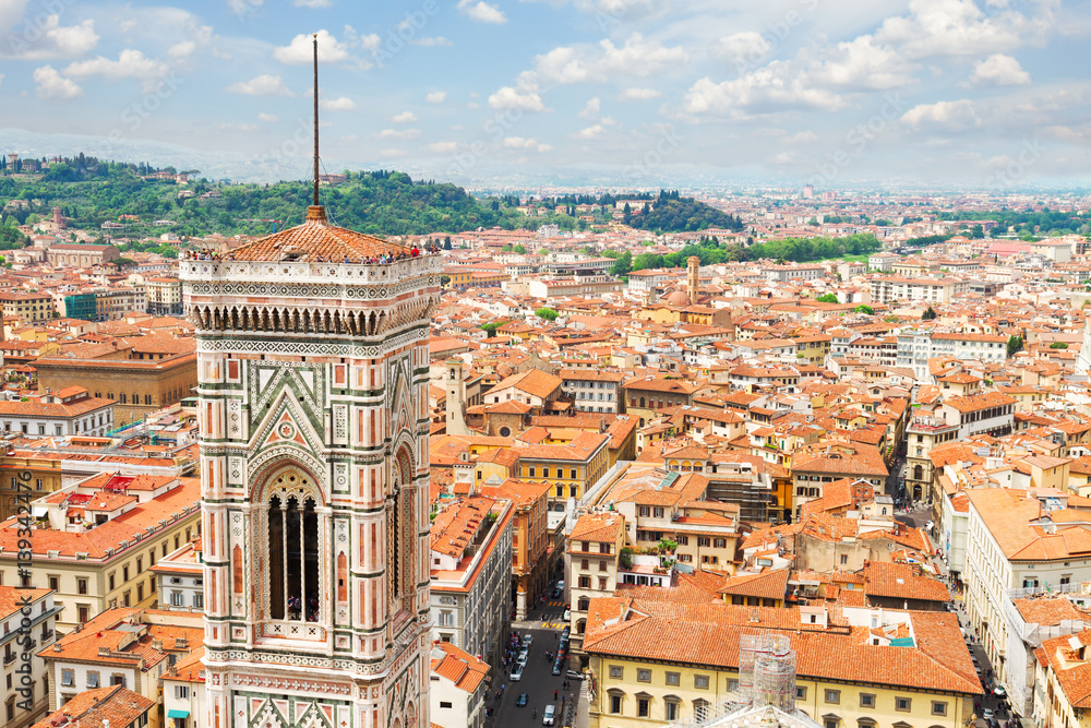 bell tower of cathedral church Duomo Santa Maria del Fiore and cityscape of Florence, Italy