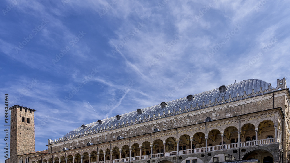 The famous Palazzo della Ragione palace in Piazza delle Erbe in Padua, Italy, against a beautiful sky