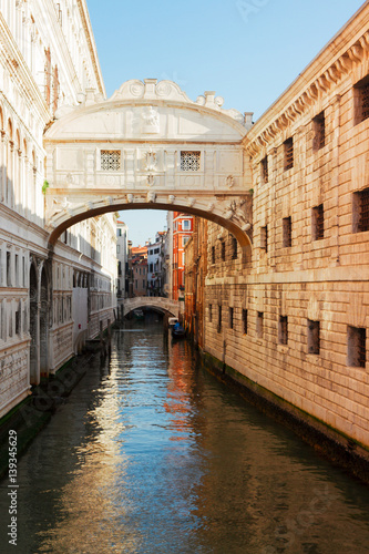Bridge of Sighs over canal, sunny day in Venice, Italy