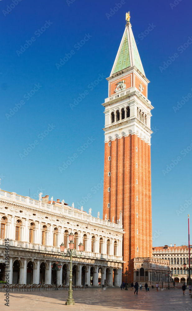 famous San Marco bell tower at sunny day, Venice, Italy