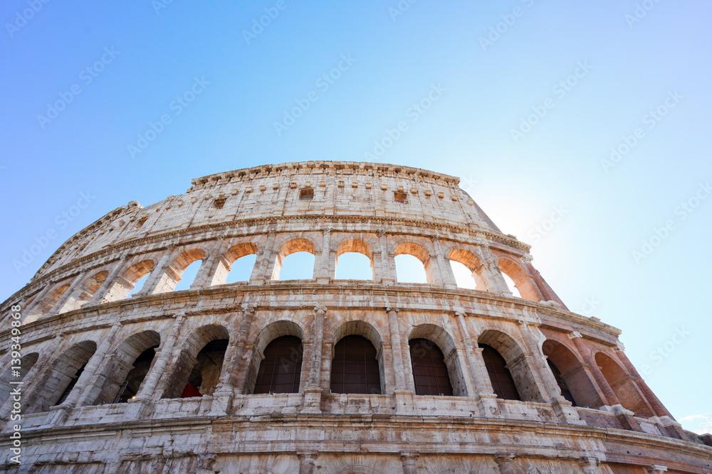 ruins of Colosseum, close up details of facade, sunny day in Rome Italy