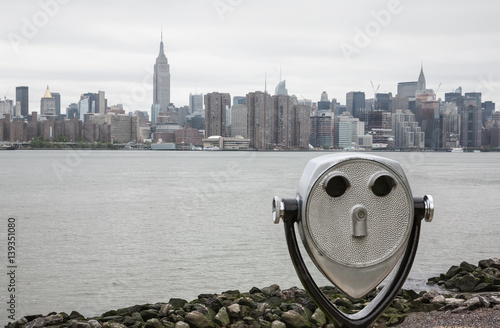 Binoculars and New York City Manhattan skyline