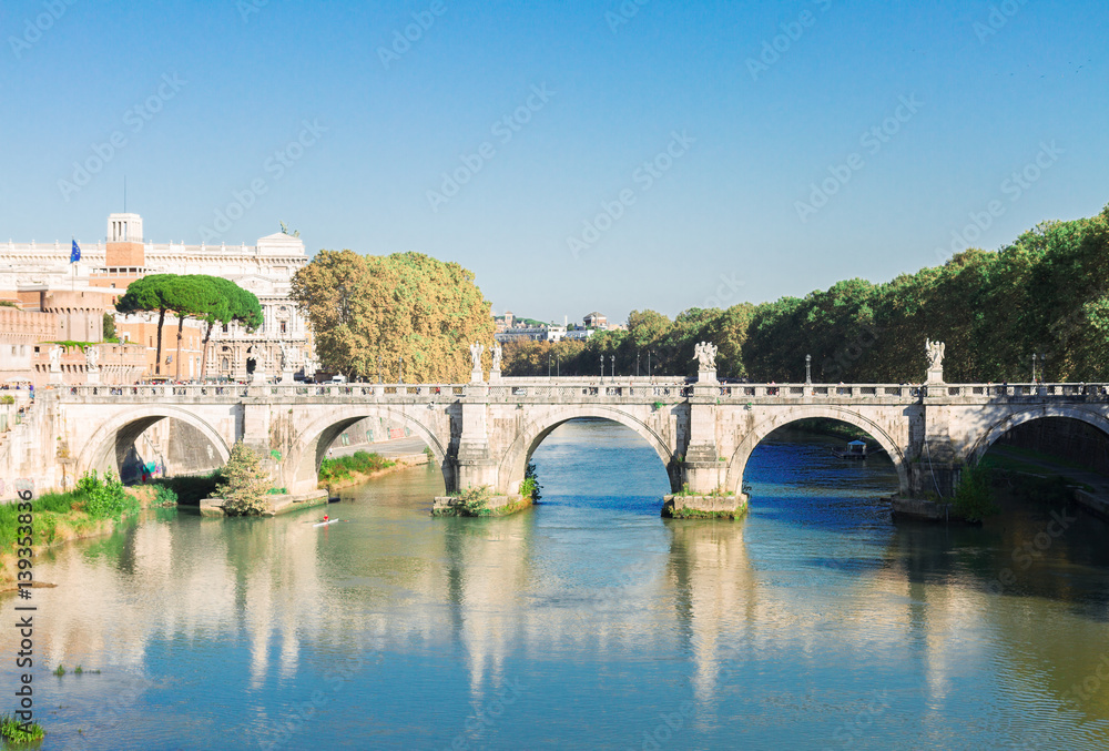 famous bridge of Angels with river Tiber , Rome, Italy