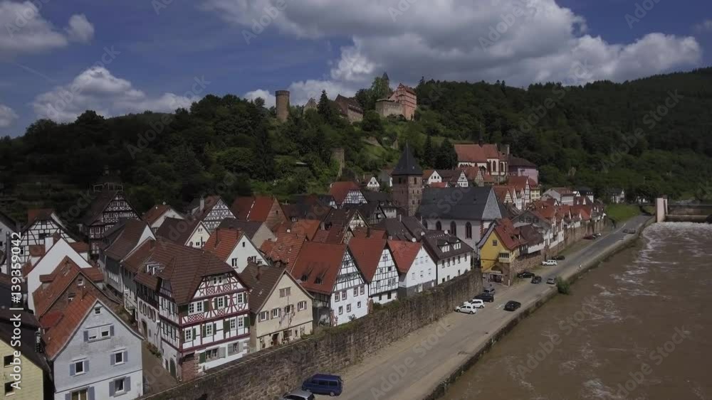 Ancient town village of HIRSCHHORN in Hesse district of Germany on banks of Neckar river, Hesse, Germany, Aerial, Mai 2016 Ancient town village of HIRSCHHORN in Hesse district of Germany on banks of Neckar river, Hesse, Germany, Aerial, Mai 2016