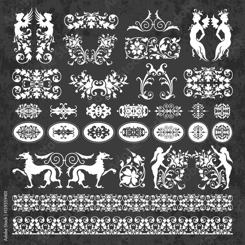 Decorative calligraphic ornaments and elements on a chalkboard background - vector set