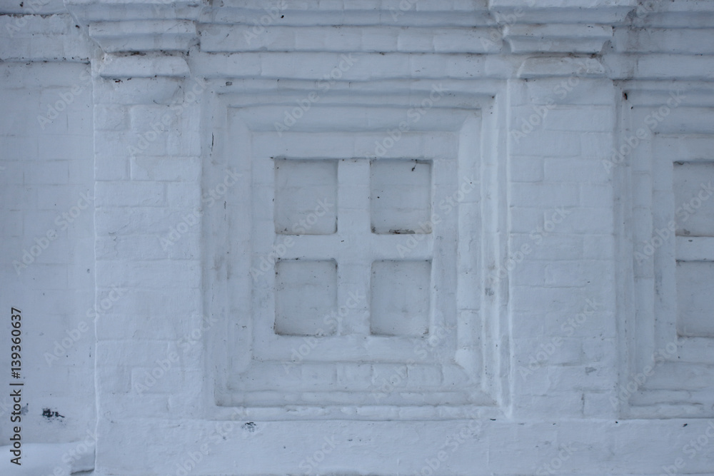 White stone window frame made of bricks White stone window frame made of bricks
