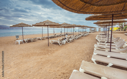 Fototapeta Naklejka Na Ścianę i Meble -  Morning on a public beach near, Eilat -famous resort in Israel