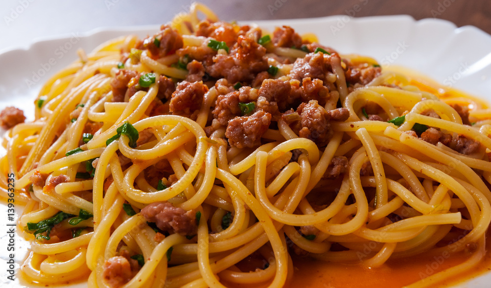 spaghetti pasta with vegetables and minced meat in a plate spaghetti pasta with vegetables and minced meat in a plate