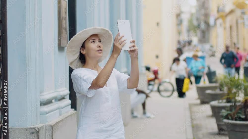 Girl doing street picture on your tablet. Girl doing street picture on your tablet.