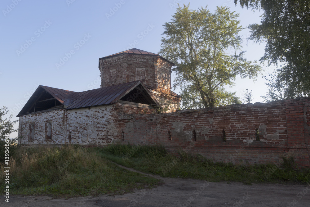 Ruins of the Church of the Assumption of the Blessed Virgin with hospital ward Trinity-Gleden Monastery summer morning. Village Morozovitsa, Velikoustyugsky District, Vologda Region, Russia Ruins of the Church of the Assumption of the Blessed Virgin with hospital ward Trinity-Gleden Monastery summer morning. Village Morozovitsa, Velikoustyugsky District, Vologda Region, Russia