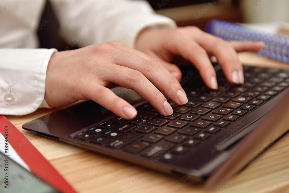 businesswoman typing on laptop businesswoman typing on laptop
