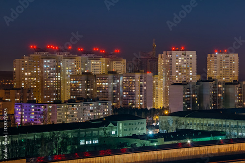 Night view to urban modern apartment buildings, Voronezh, Russia