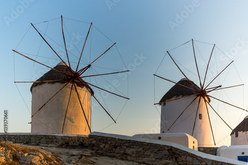 Sunset view of White windmills on the island of Mykonos, Cyclades, Greece