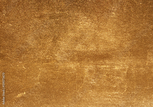 Shiny yellow leaf gold foil texture background