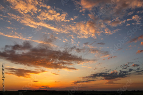 sunset over the field © serkucher