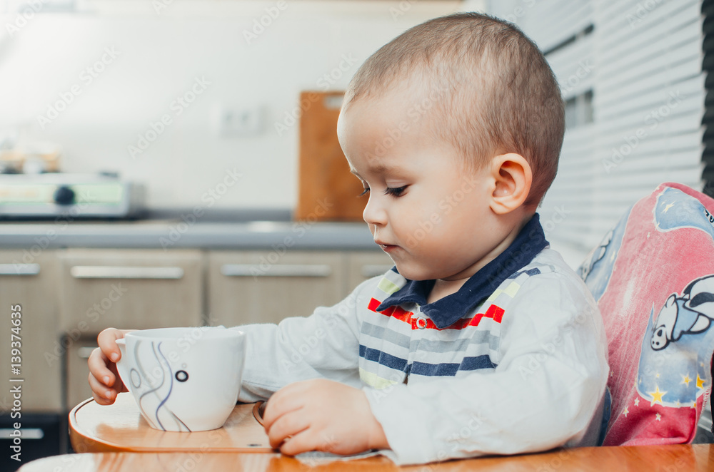 child drinking tea child drinking tea