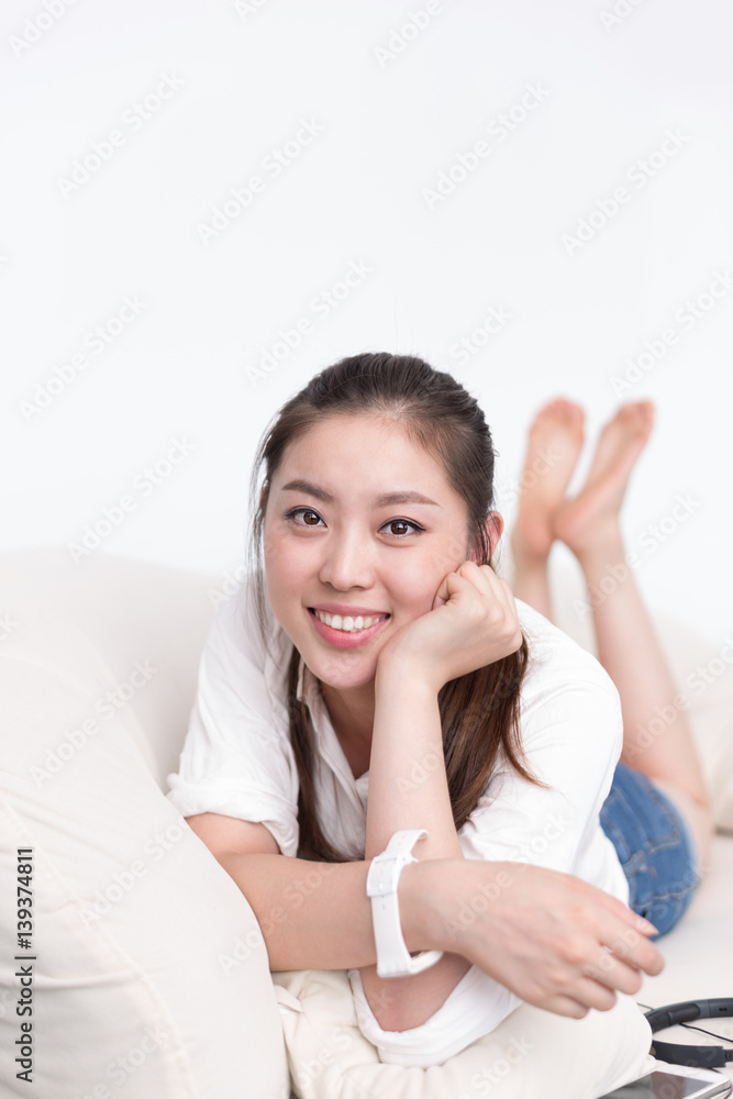 young pretty woman lies with pillow young pretty woman lies with pillow