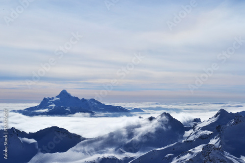 beautiful view of clouds crossing the mountain ridge.